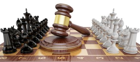 gavel on chess board