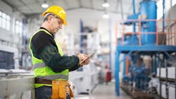 HVAC technician using tablet HVAC technician using tablet