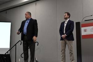 Dave Morrow (left), managing partner at Applied Marketing Knowledge, and Aaron Gunzer, AMCA’s senior manager of advocacy, brief AHR Expo 2022 attendees on VRF growth.