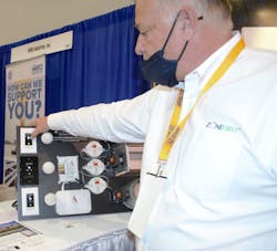 Dick Foster was on his feet all throughout the AHR Expo, explaining the advantages of the new BLISS combination light /thermostat WiFi control.