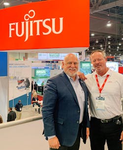 Target Sales President Dale Moody, left, with Fujitsu President and CEO Matt Peterson during the recent AHR EXPO trade show in Las Vegas. Target Sales President Dale Moody, left, with Fujitsu President and CEO Matt Peterson during the recent AHR EXPO trade show in Las Vegas.
