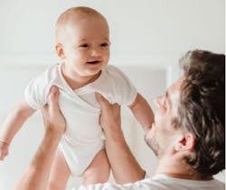 dad lifting baby dad lifting baby