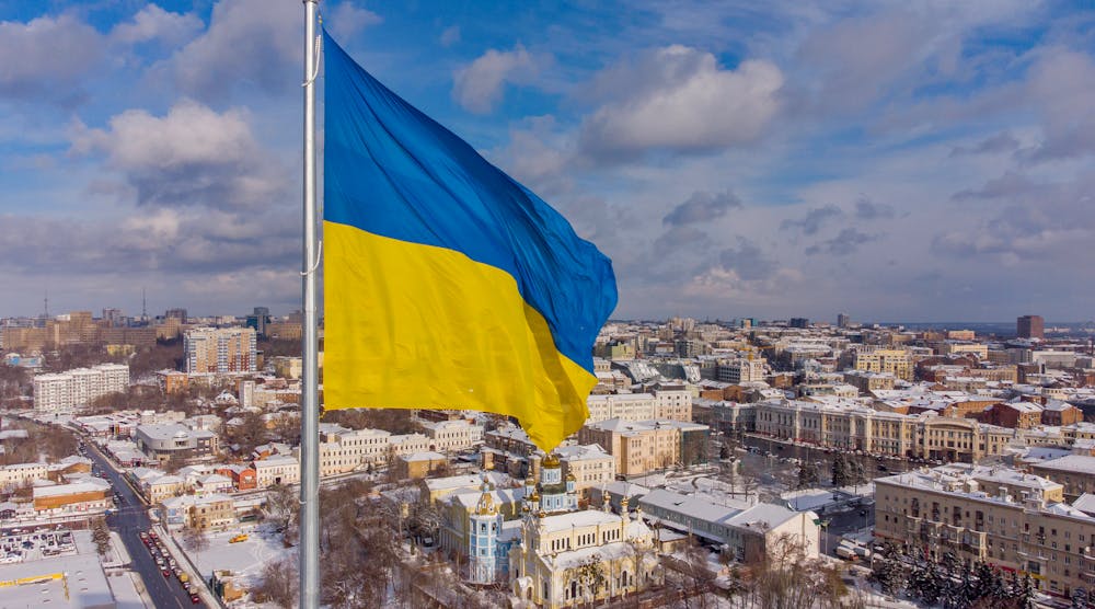 Ukrainian Flag Flying Over City Getty Images 1366126478