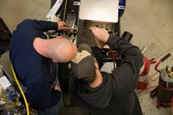 working on furnace working on furnace