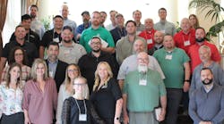 Unified Group Sales Forum attendees posed for a photo during the busy event.