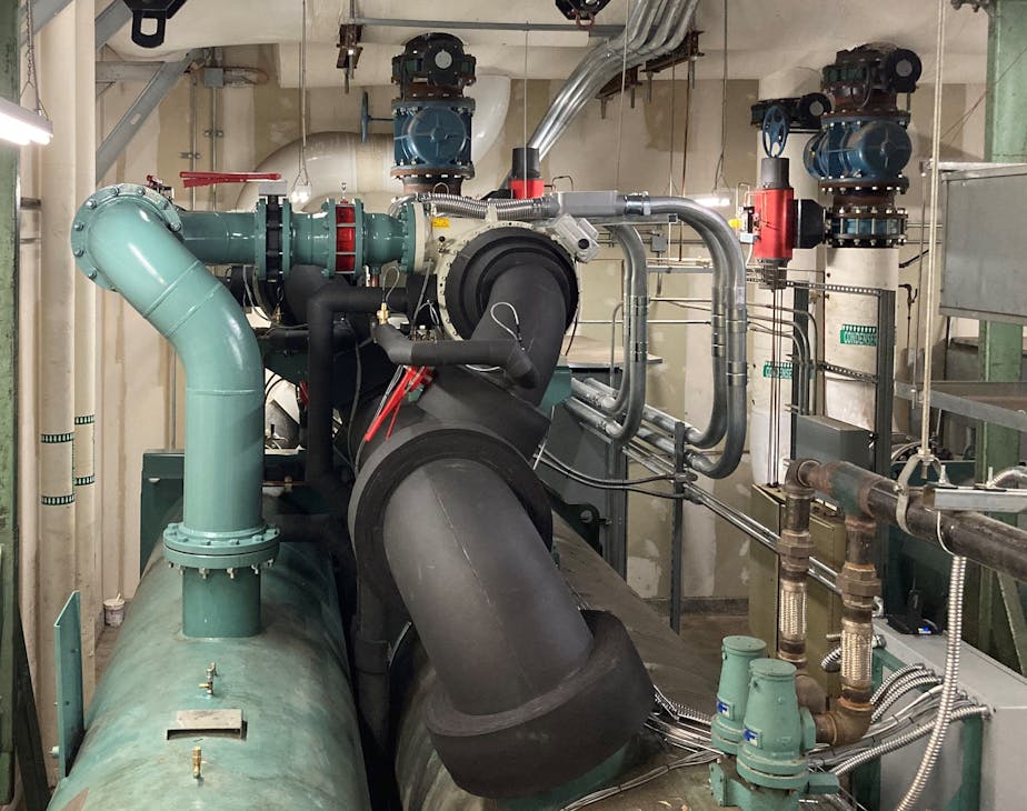 This project is the first chiller retrofit in North America to use the Hanbell oil-less variable-speed Magnetic Bearing Centrifugal (MBC) compressors. This option provides 900 tons of cooling and eliminates high peak energy charges upon start up. This project is the first chiller retrofit in North America to use the Hanbell oil-less variable-speed Magnetic Bearing Centrifugal (MBC) compressors. This option provides 900 tons of cooling and eliminates high peak energy charges upon start up.