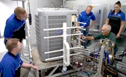 Carrier's Indianapolis engineering team prepare a heat pump for cold climate testing. Carrier's Indianapolis engineering team prepare a heat pump for cold climate testing.
