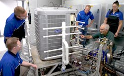 Carrier's Indianapolis engineering team prepare a heat pump for cold climate testing. Carrier's Indianapolis engineering team prepare a heat pump for cold climate testing.
