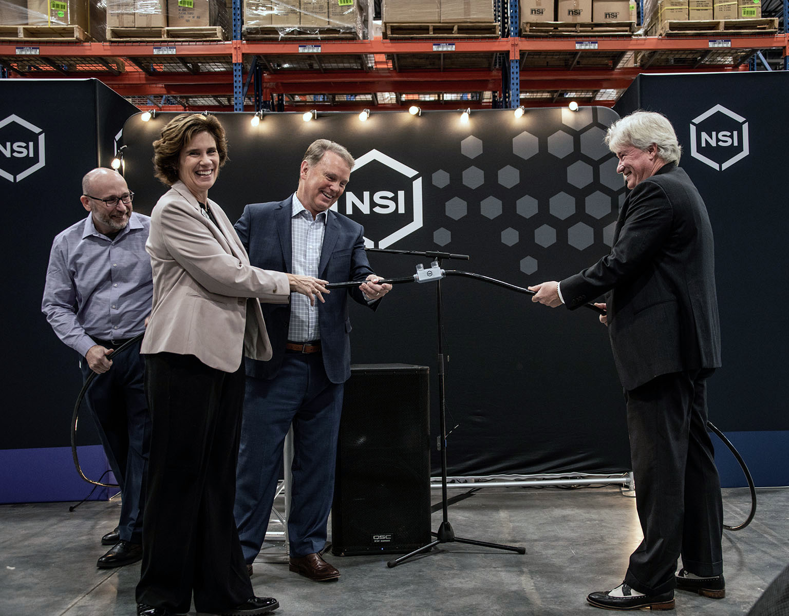 From left: Jim Piazza, NSI vice president, marketing; Margaret Thornton, associate director at the ROC Charlotte; G.R. Schrotenboer, NSI CEO; Bill Russel, president/CEO, Lake Norman Chamber of Commerce.