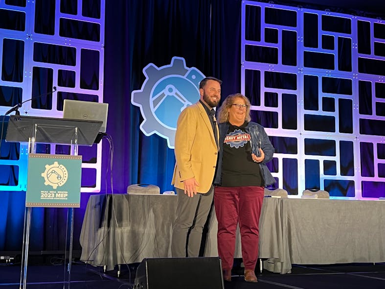 Angie Simon receives the inaugural &apos;Industry Advocate Award&apos; at the 2023 MEP Innovation Conference for her efforts with the Heavy Metal Summer Experience.
