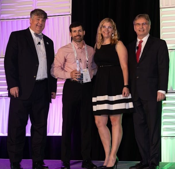 Jimmy Hiller, Jr. and Megan Manning accept Hiller&rsquo;s Residential Contractor of the Year award from ACCA representatives Barton James, CEO (left) and outgoing chairman Keith Paton.