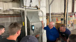 National Comfort Institute Instructor Mark Hunt teaches students how to interpret combustion analyzer readings in a recent training class.