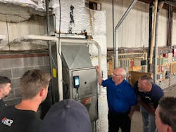 National Comfort Institute Instructor Mark Hunt teaches students how to interpret combustion analyzer readings in a recent training class.