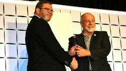 New ACCA Chairman Martin Hoover, left, co-owner of Empire Heating & Air Conditioning, accepts the ACCA gavel from outgoing chairman Steve Pape, Pape Air Conditioning & Heating. New ACCA Chairman Martin Hoover, left, co-owner of Empire Heating & Air Conditioning, accepts the ACCA gavel from outgoing chairman Steve Pape, Pape Air Conditioning & Heating.