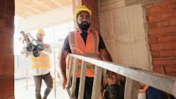 6606ed3c704ecf001e3cec8c Construction Workers Dreamstime L 134996491 6606ed3c704ecf001e3cec8c Construction Workers Dreamstime L 134996491