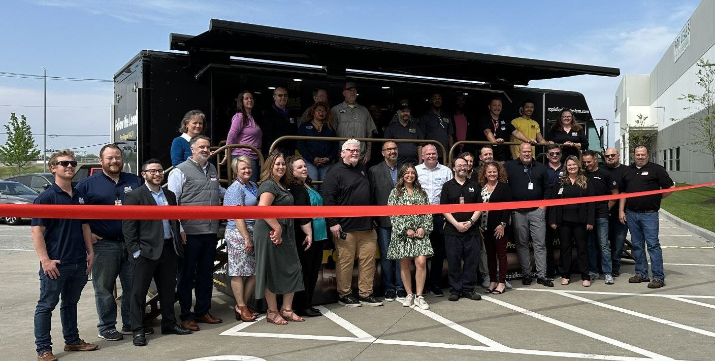 RLS employees and guests at the April 18 ribbon-cutting.