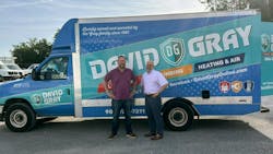 Gary Gray, left, owner of David Gray, with Southern Home Services CEO Bryan Benak. Gary Gray, left, owner of David Gray, with Southern Home Services CEO Bryan Benak.