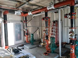 SCFS decided to prefabricate many of the final components at their off-site fabrication shop and use modular products when possible to expedite installation times and reduce risk of field rework. Victaulic headers and vibration isolation pump drops were used in this area of the mechanical room. (Source: Victaulic) SCFS decided to prefabricate many of the final components at their off-site fabrication shop and use modular products when possible to expedite installation times and reduce risk of field rework. Victaulic headers and vibration isolation pump drops were used in this area of the mechanical room. (Source: Victaulic)