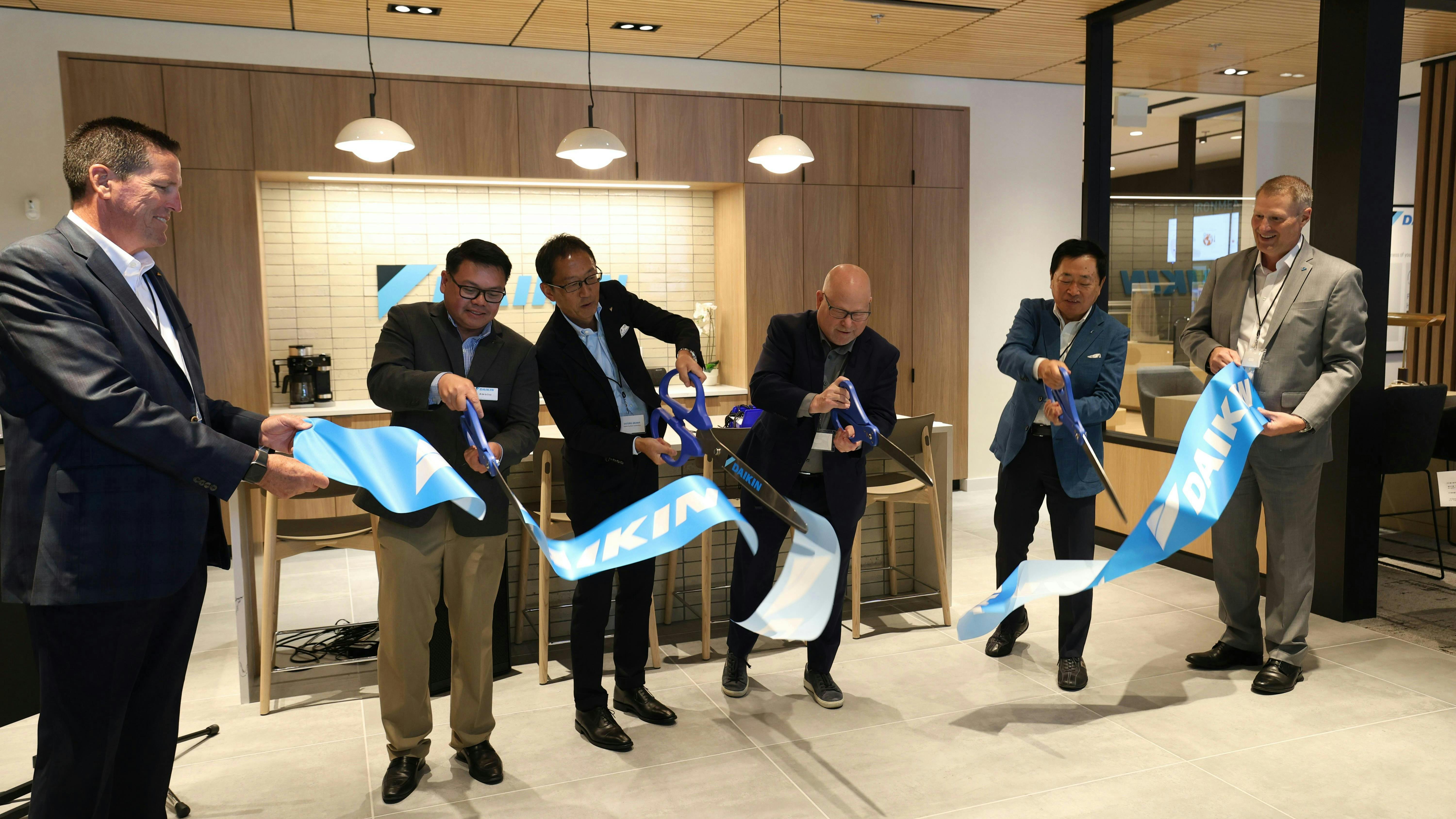 66a7a30f1fdf9c2ae21d3b4f Daikin Seattle Ribbon Cut