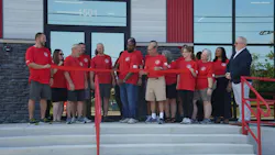 MId-City Supply employees gather for the ribbon-cutting at its renovated location. MId-City Supply employees gather for the ribbon-cutting at its renovated location.