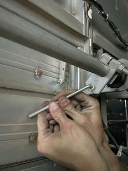 Broken door linkage; a small but important catch. Broken door linkage; a small but important catch.