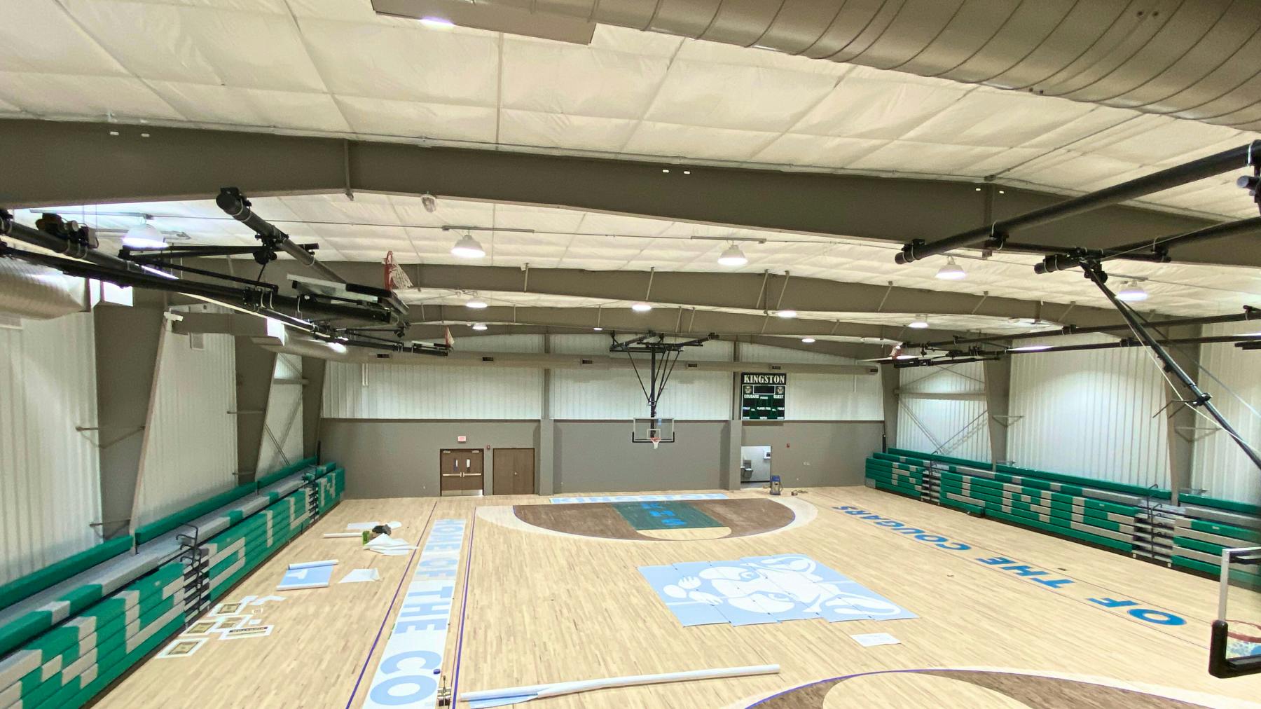 The addition connects to the classroom portion of the original building by a 1,272-square-foot masonry addition that houses an egress stair relocated from the existing building.