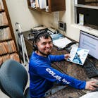 A member of Colair Inc.'s dispatch team at work in the office. A member of Colair Inc.'s dispatch team at work in the office.
