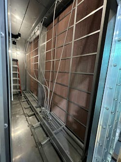 An Evaporative Pad Humidifier installed in AHU (downstream). An Evaporative Pad Humidifier installed in AHU (downstream).