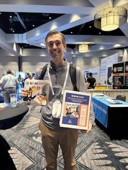 Ryan Kiscaden, author of 'The Air Came to a Stop' shows off the children's book and activity kit, available through ACCA, during the ACCA 2025 Expo in Austin, Texas. Ryan Kiscaden, author of 'The Air Came to a Stop' shows off the children's book and activity kit, available through ACCA, during the ACCA 2025 Expo in Austin, Texas.