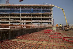 The University of Chicago North Residential Commons features 300,000 feet of radiant heating and cooling piping: The building’s common areas are heated via a traditional forced-air system, while the student living quarters use REHAU in-slab hydronic radiant heating and cooling. By circulating heated or chilled water through 5/8-inch PEXa pipe installed in the ceilings on each floor, the hydronic system maintains the spaces at even, comfortable temperatures while using less energy than traditional forced-air systems. The University of Chicago North Residential Commons features 300,000 feet of radiant heating and cooling piping: The building’s common areas are heated via a traditional forced-air system, while the student living quarters use REHAU in-slab hydronic radiant heating and cooling. By circulating heated or chilled water through 5/8-inch PEXa pipe installed in the ceilings on each floor, the hydronic system maintains the spaces at even, comfortable temperatures while using less energy than traditional forced-air systems.