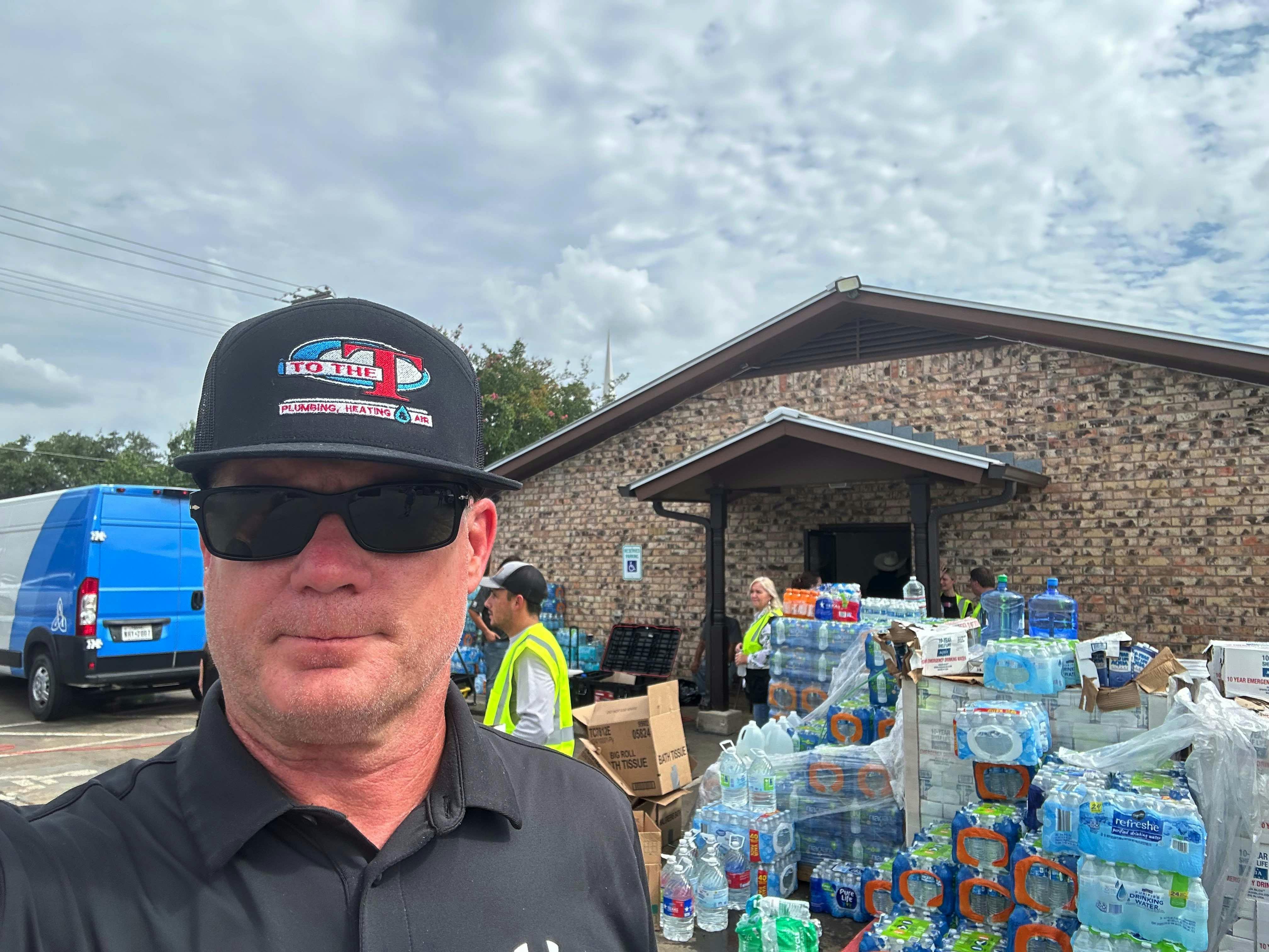 Lane Williams, owner of To the T Plumbing Heating and Air of Austin, volunteered in the community after the July 4 flash floods, and were still taking calls and scheduling service through Housecall Pro's mobile app.