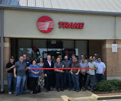 Trane team members take part in a ribbon-cutting ceremony during the grand opening celebration of the new Trane sales and distribution office in Fort Smith, Arkansas, on May 14. Trane team members take part in a ribbon-cutting ceremony during the grand opening celebration of the new Trane sales and distribution office in Fort Smith, Arkansas, on May 14.