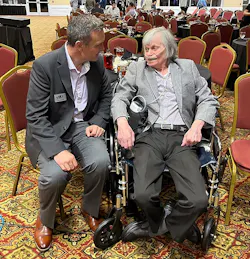 Jim Davis and Adam Mufich chatting after the awards banquet at Summit 2024.