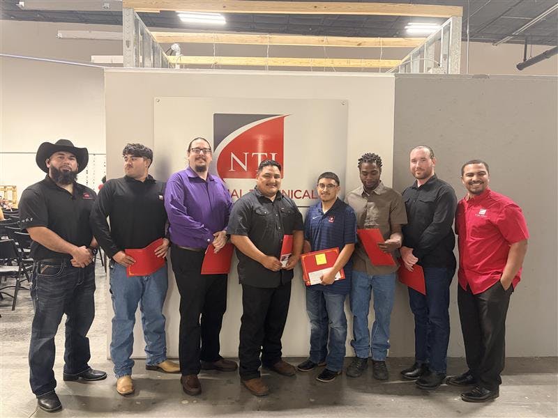 Some of NTI's Houston HVAC class graduates pose for a picture.