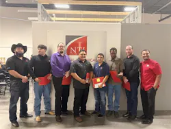 Some of NTI's Houston HVAC class graduates pose for a picture.